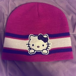 I am selling a hello kitty purple beanie made in 2015 by the company Sanrio